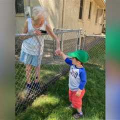 Little Boy Finds Sweet Friendship With 99-Year-old Woman Over the Fence During Lockdown (WATCH)